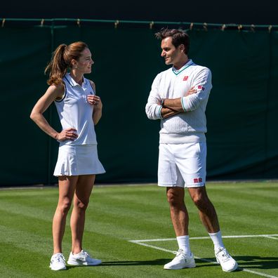 LONDON, ENGLAND - JUNE 24:  In this handout images released by Kensington Palace on June 24, 2023, Catherine, Princess of Wales and Wimbledon Champion Roger Federer talk before playing tennis on No.3 Court at The All England Lawn Tennis Club, Wimbledon, on June 8, 2023 in London, England. (Photo by Handout/Thomas Lovelock - AELTC via Getty Images)