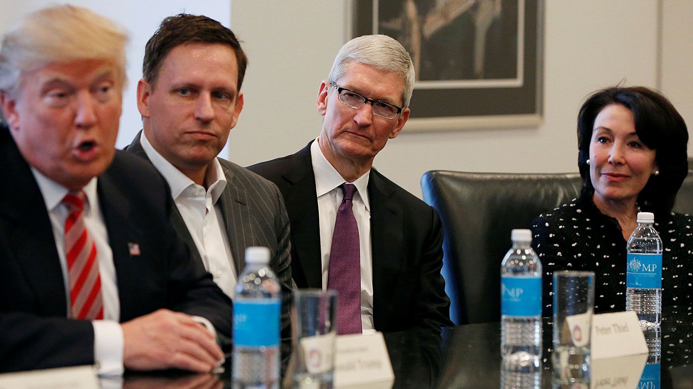 U.S. President-elect Donald Trump speaks as (2nd L to R) PayPal co-founder and Facebook board member Peter Thiel, Apple Inc CEO Tim Cook and Oracle CEO Safra Catz look on during a meeting with technology leaders at Trump Tower in New York. (Reuters)