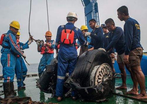 Indonesian rescuers lift recovered wheels of the crashed Lion Air JT-610 on board of a rescue ship in the water off Karawang, West Java, Indonesia, 4 November 2018. Lion Air flight JT-610 lost contact with air traffic controllers soon after takeoff then crashed into the sea on 29 October. The flight was en route to Pangkal Pinang, and reportedly had 189 people onboard.