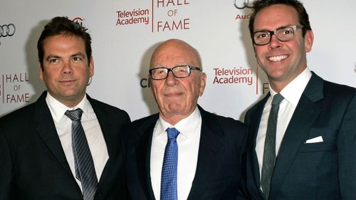 News Corp. Exeuctive Chairman Rupert Murdoch, center, and his sons, Lachlan, left, and James Murdoch attend the 2014 Television Academy Hall of Fame in Beverly Hills. (AAP)