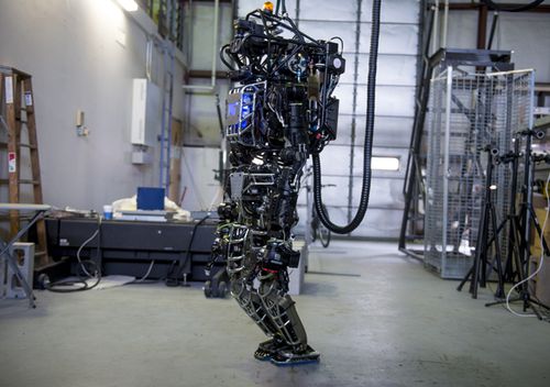 The capabilities of the Boston Dynamics funded Atlas robot are demonstrated during the Massachusetts Institute of Technology's Computer Science and Artificial Intelligence Laboratory's Demo Day in 2013.