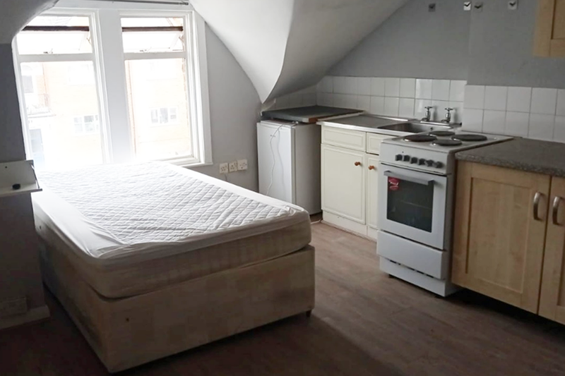 Tiny one-bedroom flat in South London is on the market with monthly rent of just under $2k, and bizarrely sees the double bed located next to the oven