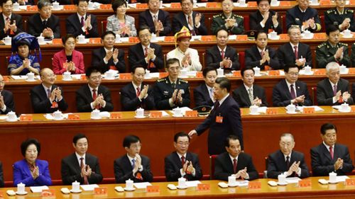 China's Communist Party inserts Xi into party constitution
