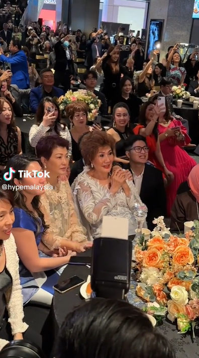 Michelle Yeoh's mother Janet Yeoh waits to hear who has won the Oscar for Best Actress, 2023.