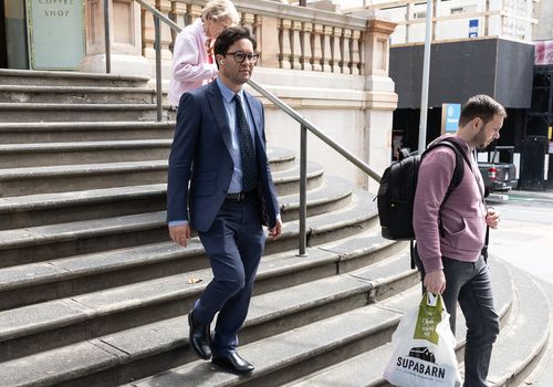 NEWS: David Charles Massa, (blue suit) accused of raping another man inside a nightclub on Oxford Street, departs Downing Centre courts.  January 2026, Photo: Wolter Peeters, The Sydney Morning Herald.