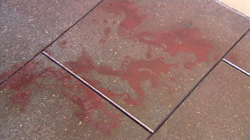 Blood stains mark the streets of Randwick. 