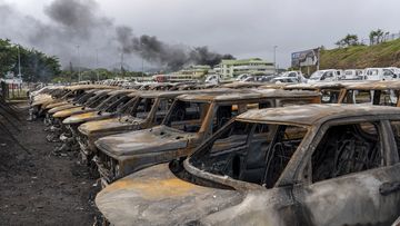 Government working to bring home Aussies stranded among New Caledonia riots