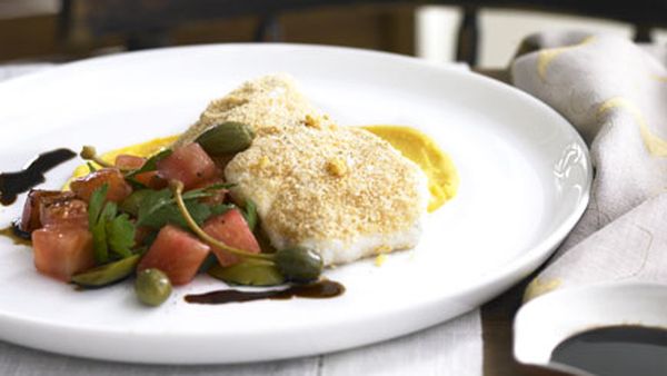 Olive oil-poached groper with romesco crumbs, pumpkin purée and caperberry and olive salad