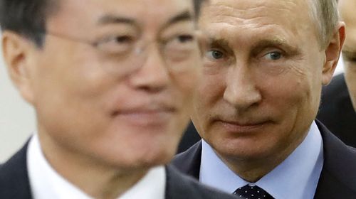 Vladimir Putin, right, and his South Korean counterpart Moon Jae-in. (AAP)