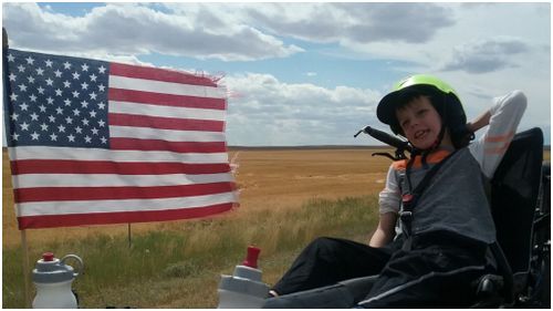 Patch is travelling across America on a tandem bike. (School of the Road)