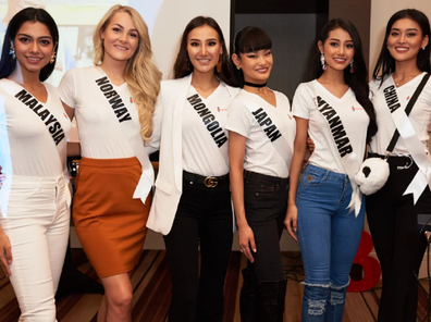 Htet (second from right) pictured with fellow Mis Universe contestants.