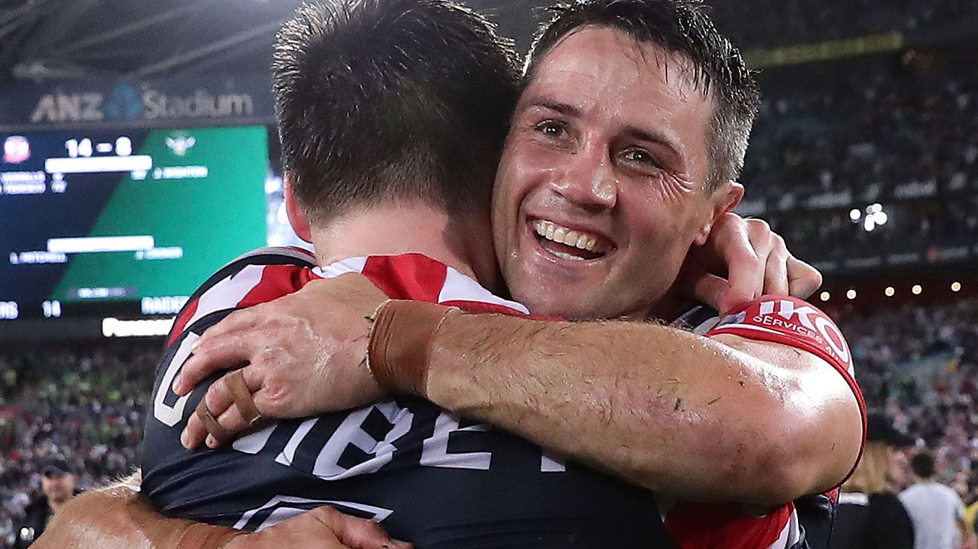 Cooper Cronk celebrates winning the 2019 NRL grand final with the Sydney Roosters
