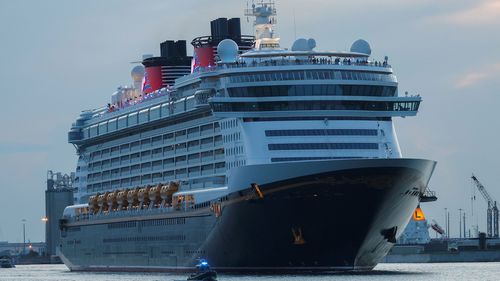 Two guests, said to be a father and his young daughter, have been rescued by crew after going into the water while onboard the Disney Dream cruise ship as it returned from a voyage around the Bahamas.