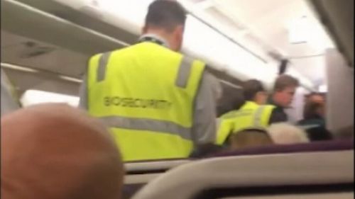 Footage from onboard the plane shows several paramedics and security responding.