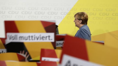 Chancellor Angela Merkel vows to win back voters from nationalist Alternative for Germany. (AAP)