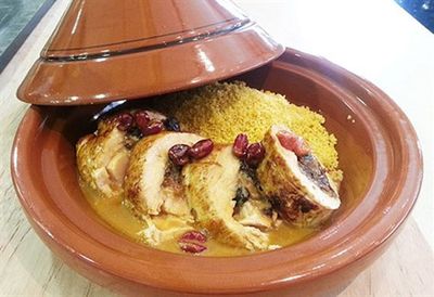 Turkey tagine with carrot couscous and rose petals