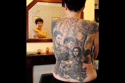 Nothing gets people talking like a garish, over-sized tattooed tribute to <i>Twilight</i>. Bizarre 49-year-old bakery clerk Cathy Ward became an overnight internet sensation when she spent 22 hours and $3000 having this done to herself.