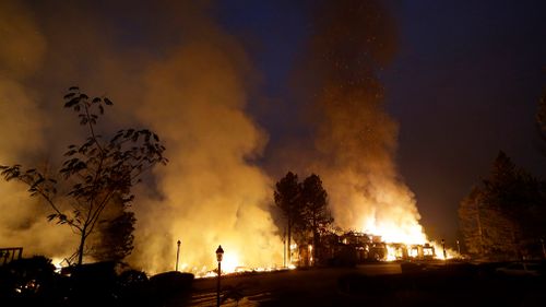 Smoke and flames from fire at the Hilton Sonoma Wine Country hotel in Santa Rosa. (AP)