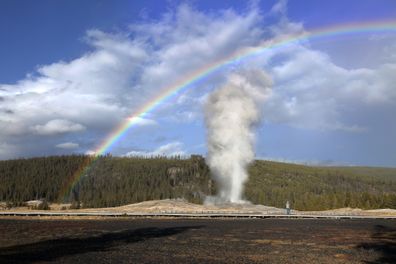 Old Faithful is a cone geyser located in state of Wyoming, Yellowstone National Park in the United States. 