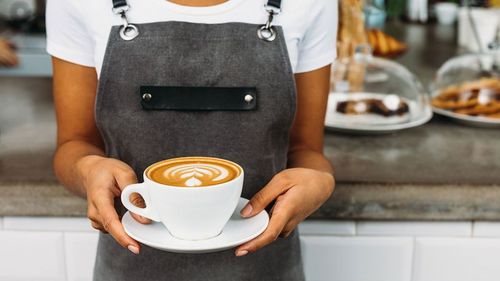 Casual worker in a coffee shop.