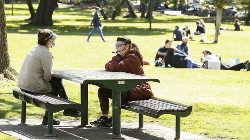 A person wearing a face-shield is seen in the Royal Botanic Gardens on September 28, 2020 in Melbourne, Australia. 