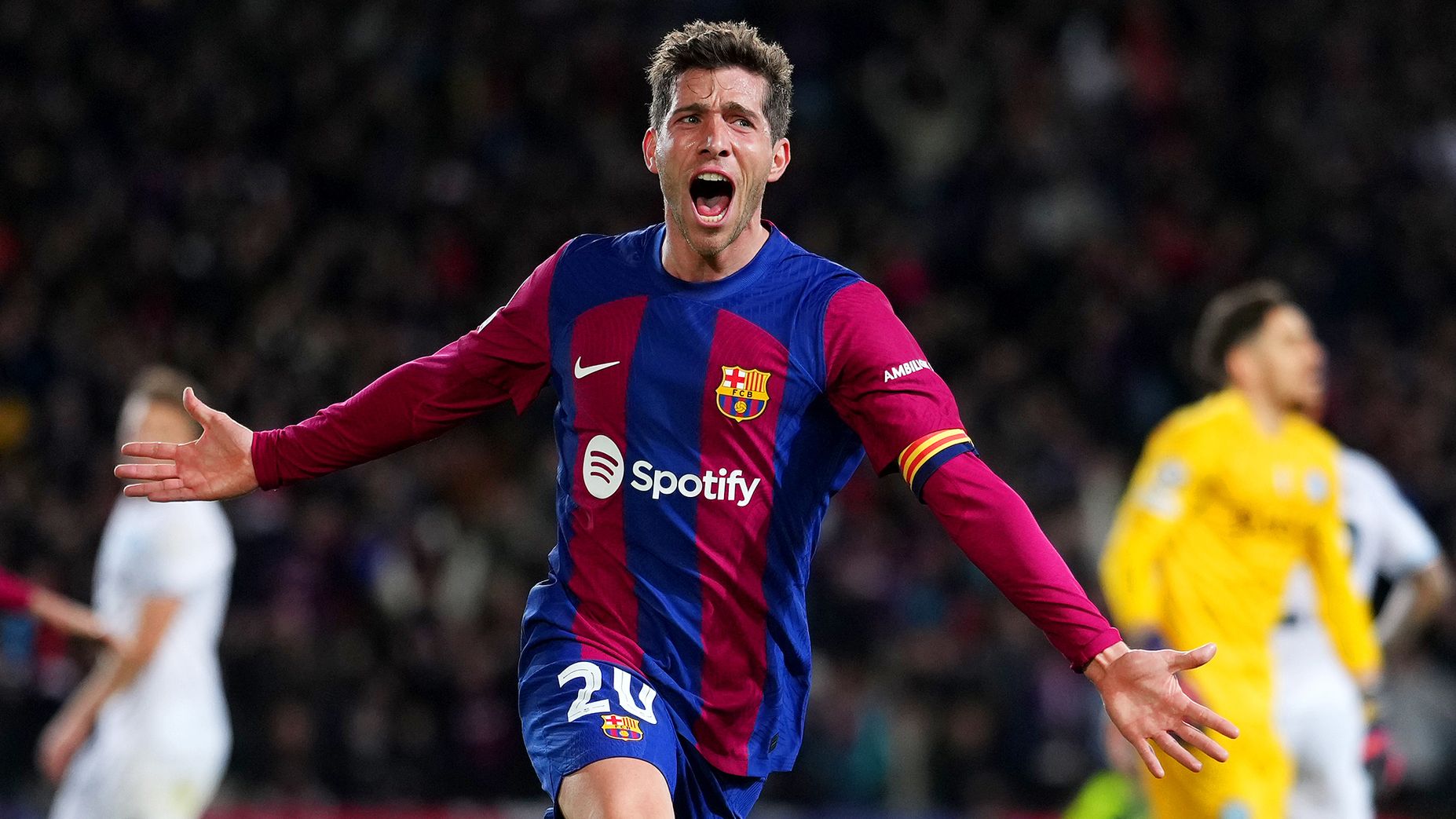 Sergi Roberto of FC Barcelona celebrates after Robert Lewandowski of FC Barcelona (not pictured) scores his team&#x27;s third goal during the UEFA Champions League round of 16 second leg match.