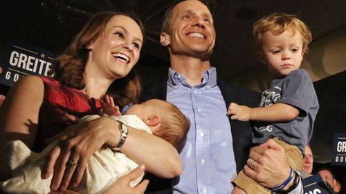 Eric Greitens poses with his wife, Sheena and his two sons Jacob and Joshua in 2016. (AAP)