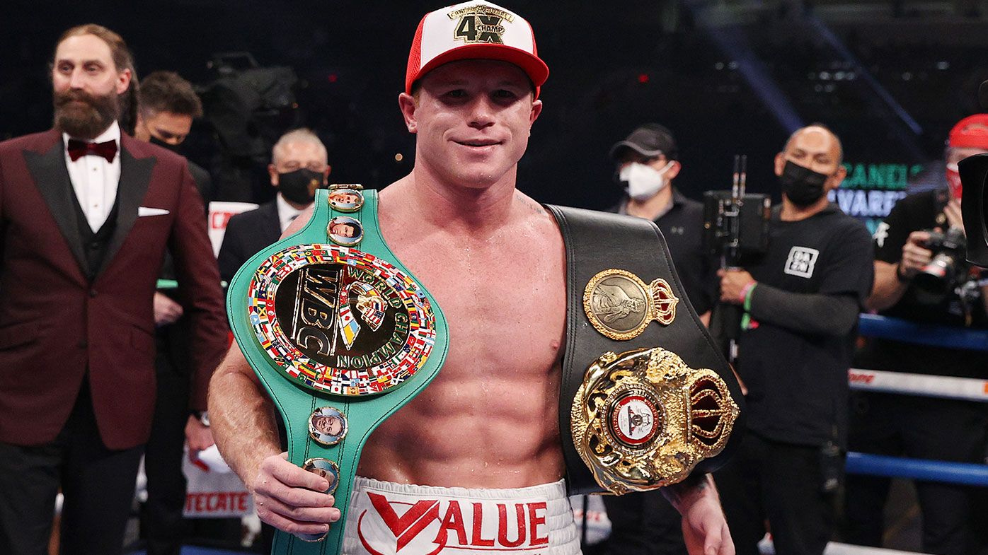 Canelo Alvarez celebrates after defeating Callum Smith (not pictured) during their super middleweight title bout 