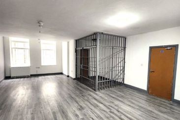 flat for rent in UK jail cell in living room domain 