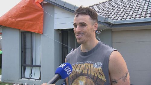 A Gold Coast couple had a miraculous escape after lightning struck their home, setting it alight as fierce thunderstorms and gale-force winds wreaked havoc across south-east Queensland.
