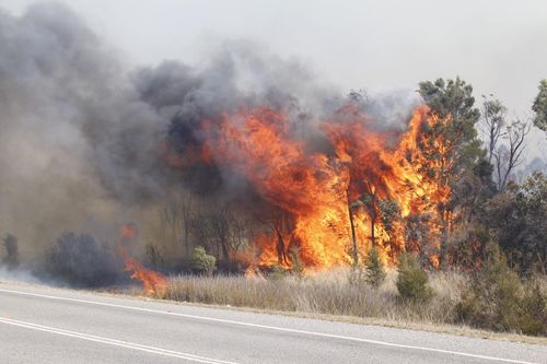 The spot fires are making work difficult for fire crews. (AAP)