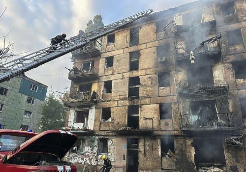 Emergency workers extinguish a fire after missiles hit a multi-story apartment building in Kryvyi Rih, Ukraine, Tuesday, June 13, 2023.  