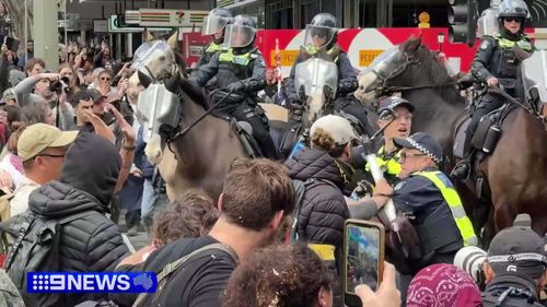 Violent clashes in Melbourne between protesters and police.