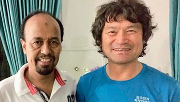 Pakistan Alpine Club secretary Karrar Haidri, left, is pictured with missing Korean climber Kim Hong Bin.