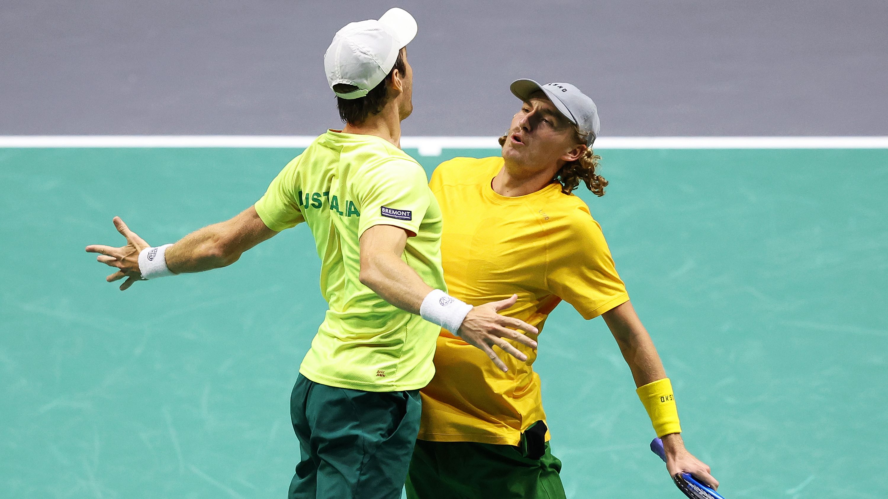 Matthew Ebden and Max Purcell of Team Australia celebrate with a chest bump after winning the doubles match against Edouard Roger-Vasselin and Nicolas Mahut (not pictured) winning a point during the Davis Cup Finals Group Stage match between France and Australia at AO Arena on September 14, 2023 in Manchester, England. (Photo by Matt McNulty/Getty Images for ITF)