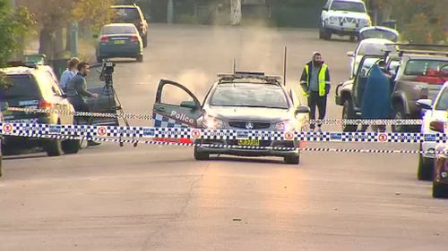 Relatives and friends clashed with police after shooting. (9NEWS)