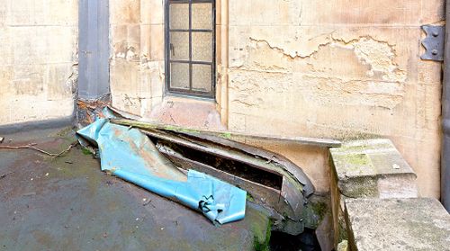 Corrosion has occurred in gutters and downpipes, resulting in plumbing failure and visible damage to stonework. Picture: UK Parliament