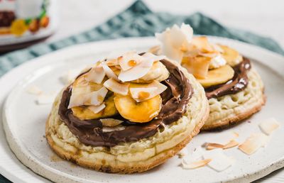 Crumpets with Nutella, caramelised banana and toasted coconut