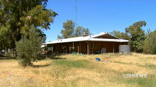 The woman's body was found inside the property. (9NEWS)