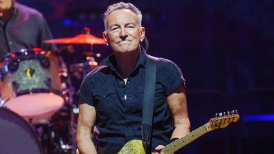 Bruce Springsteen performs on stage at Parken in Copenhagen, Denmark, on July 11. Springsteen announced he is following doctor's orders and taking more time off from touring.