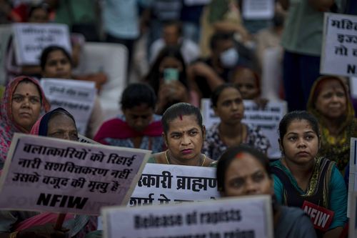 Women participate in a protest against remission of sentence by the government to convicts of a gang rape of a Muslim woman, in New Delhi, India, Saturday, August 27, 2022. 