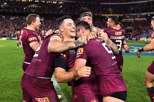 Queensland celebrate their 2017 State of Origin series victory at Suncorp Stadium in Brisbane. (AAP)