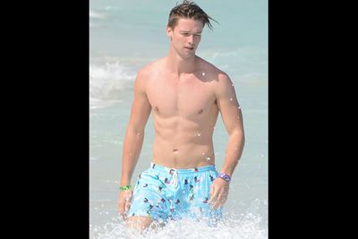 It's official, Arnie's 19-year-old son Patrick Schwarzenegger is hot! Swoon over these pics of the buff hottie hitting the beach with friends in Miami. Phwoar!