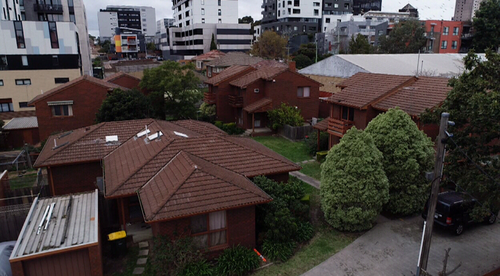 Home owners join forces to turn modest brick villas into gold mine