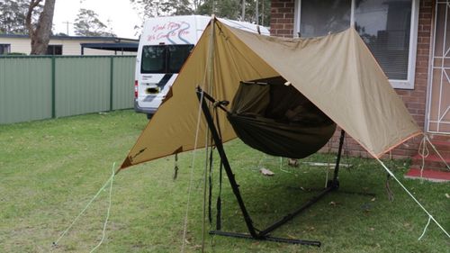 The tent Matt Walsh slept in for six months, including during winter, in his brother-in-laws Jervis Bay backyard.