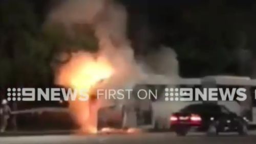 The bus became engulfed in flames just after 7pm yesterday. (9NEWS)