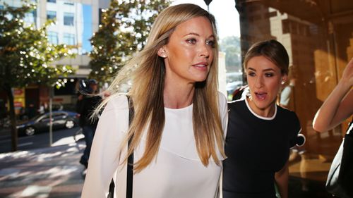Kelly Landry's lawyers have entered photos of alleged bruises and secret video and audio recordings of a fight between her and Anthony Bell. Source: AAP