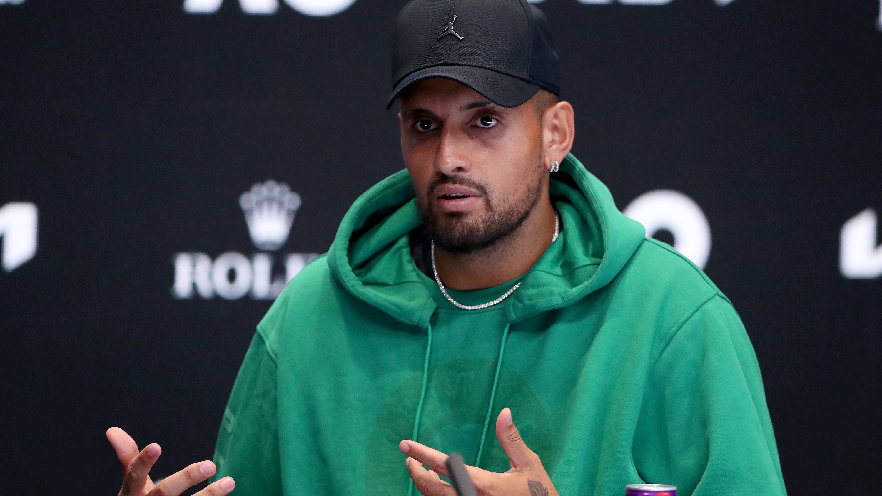 MELBOURNE, AUSTRALIA - JANUARY 14: Nick Kyrgios of Australia speaks during a press conference during a practice session ahead of the 2023 Australian Open at Melbourne Park on January 14, 2023 in Melbourne, Australia. (Photo by Kelly Defina/Getty Images)