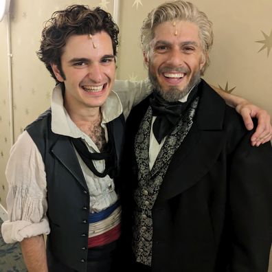 Robert Tripolino and Josh Piterman in costume as Marius and Jean Valjean ahead of a performance of Les Misérables at London's Sondheim Theatre