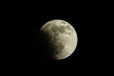 Partial lunar eclipse over Los Angeles on the morning of April 15, 2014.